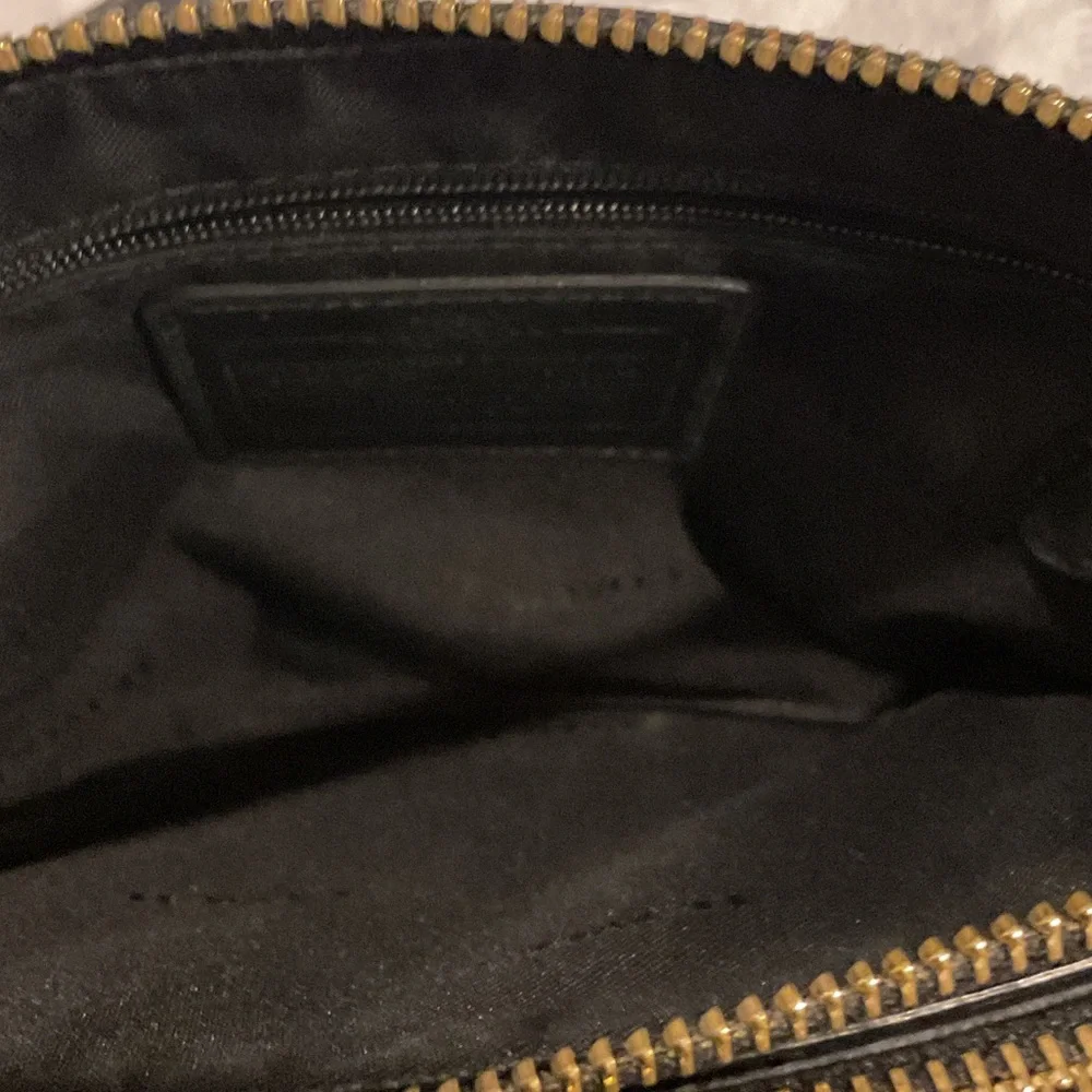 Coach Black Leather Crossbody Bag with Gold Accents